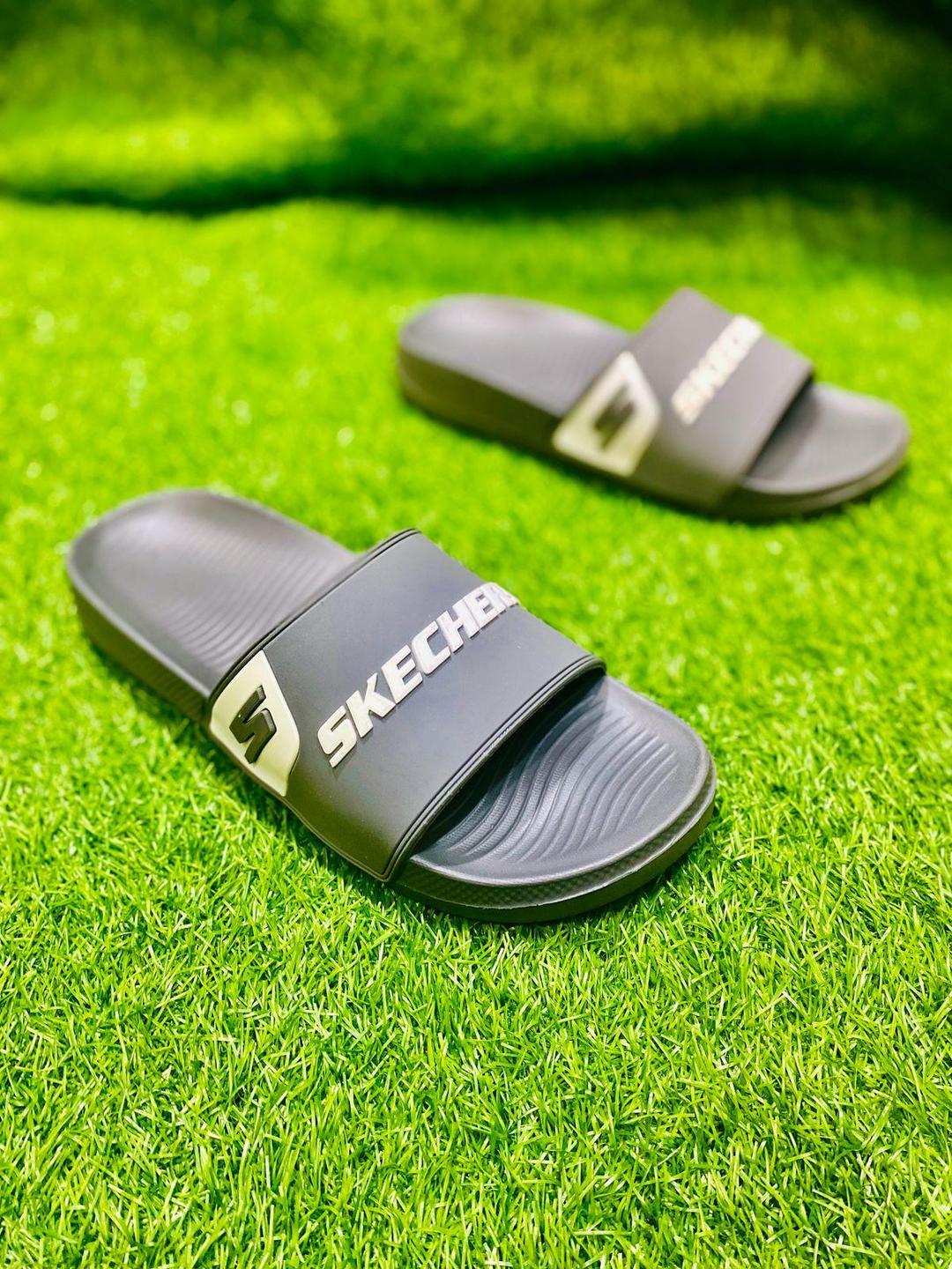 Side view showing comfortable sole of grey PU leather slippers