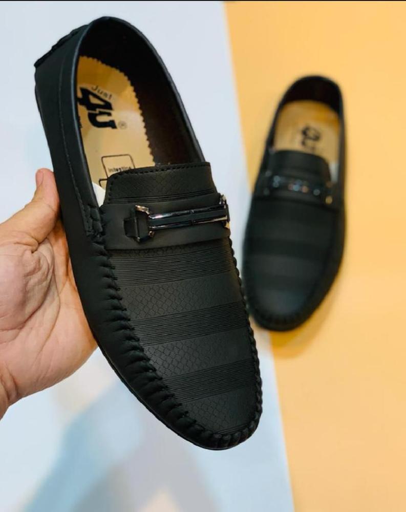 Side view of black Rexine loafers for men
