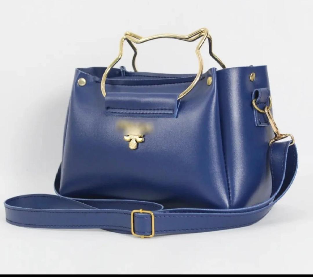 Side view showing top handle design of Women PU Leather Hand Bag
