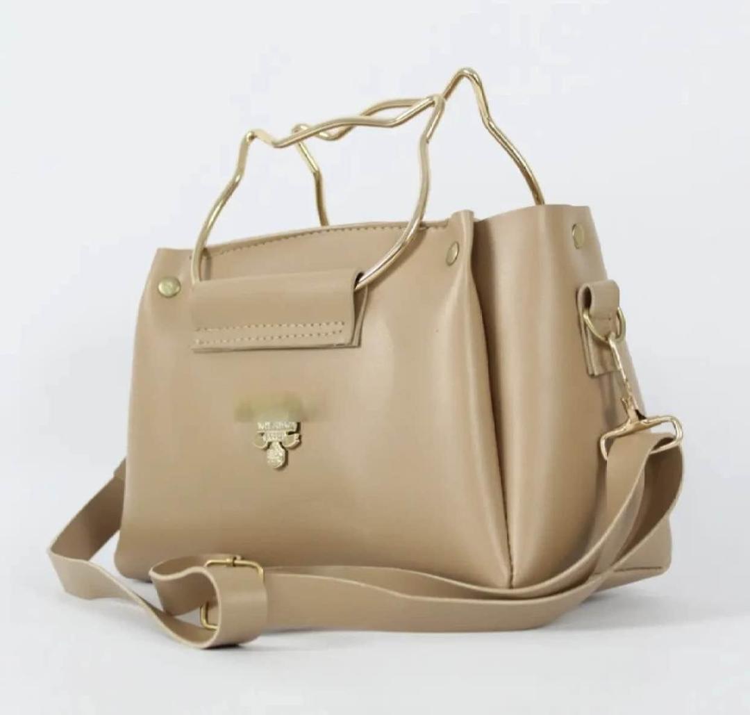 Side view showing top handle design of Women and Girl PU Leather Hand Bag