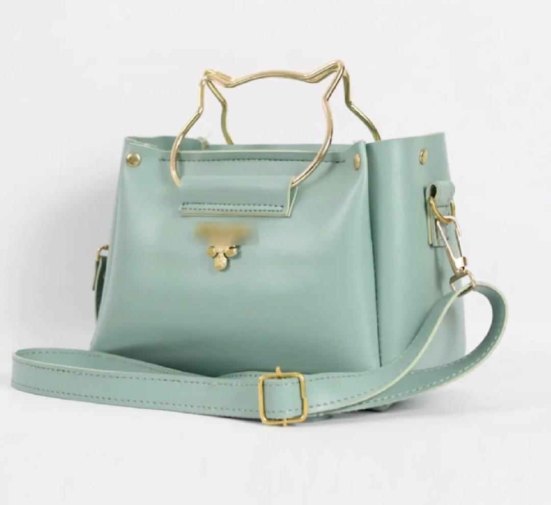 Woman carrying Women PU Leather Hand Bag in Blue