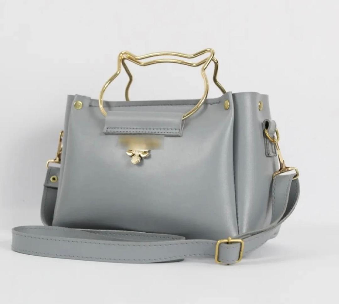 Display of multiple color options of Women PU Leather Plain Hand Bag